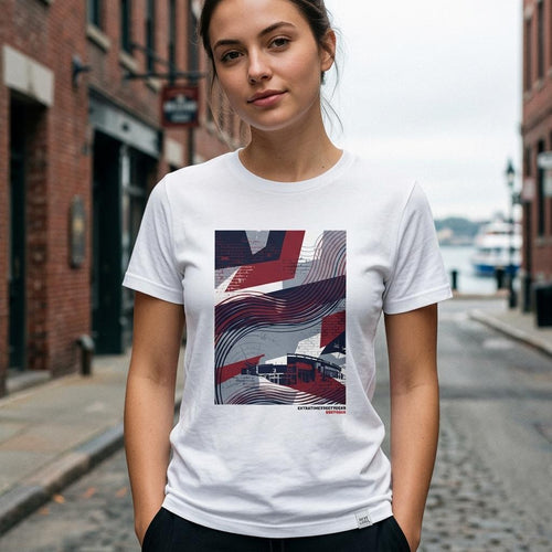 Woman wearing a white t-shirt with a graphic design on a city street