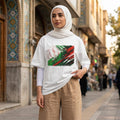 Iran Team Melli Light. Woman with hijab standing with arch doors in the background. 
