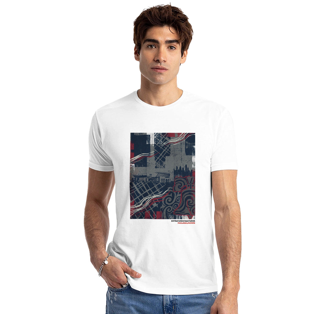 Man wearing white shirt with abstract design on front. 